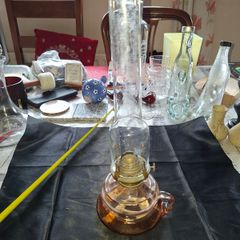 Beautiful Old Glass Thumb Oil Lamp It features a Tall Slender Glass Chimney designed to protect the flame and improve combustion Postage Available