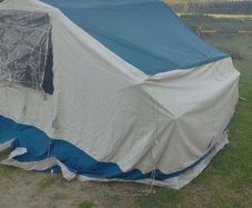 Folding trailer tent