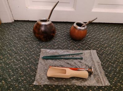 Yerba mate gourds with bombillas and accessories
