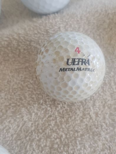 golf ball and tees