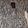 Perfect for Summer. black Zebra Print Wrap Tea Dress from Pretty Little Thing Image 5