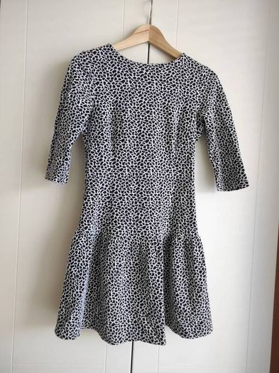 beautiful dress size XS/S , fastened with a zipper at the back, with a frill