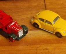 4 vintage toy cars -