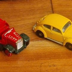 4 vintage toy cars -