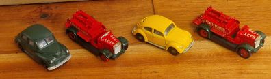 4 vintage toy cars -