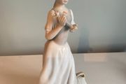 Porcelain 10 inch  figurine of a lady