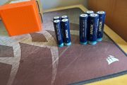 Four 18650 and 21700 Xtar button top batteries