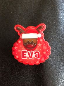 Christmas flashing badge named Eva