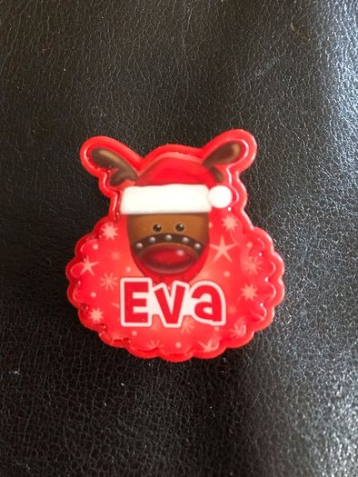 Christmas flashing badge named Eva