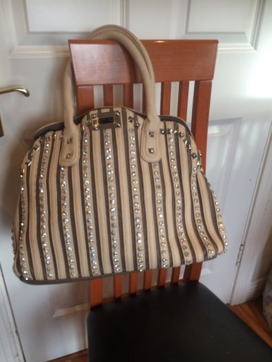 Hand bags. Rucksacks, clutch bags, purses