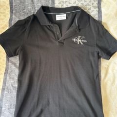 Black Calvin Klein polo shirt