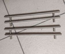 Long metal handles from wardrobe