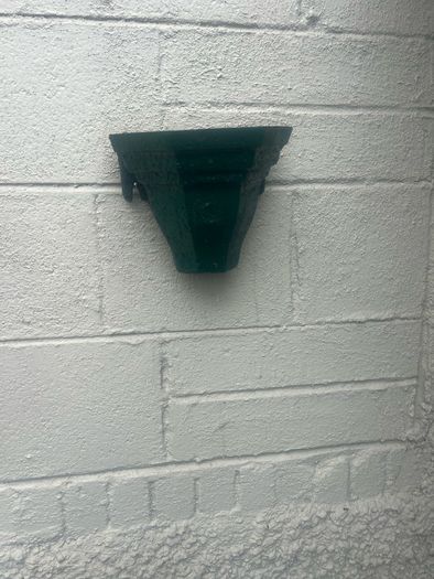 3 water hoppers converted to plant holders. With drainage
