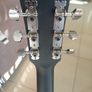 Black acoustic guitar Image 4