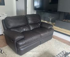 Brown recliner 2 seater .