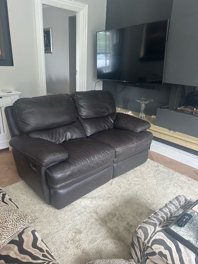 Brown recliner 2 seater .