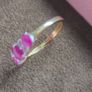 Beautiful yellow gold ring featuring three stunning rubies surrounded by sparkling cubic zirconia stones. Size M, in beautiful condition. Image 5