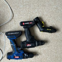 Two drills one edge trimmer and one skill saw
