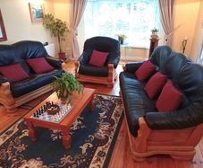 Three Piece Suite reupholstered leather