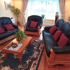 Three Piece Suite reupholstered leather