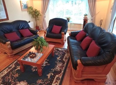 Three Piece Suite reupholstered leather