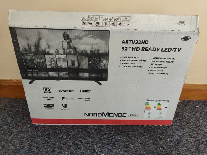 Brand new TV with original remote.