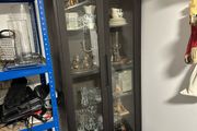 Tall glass and wood cabinet