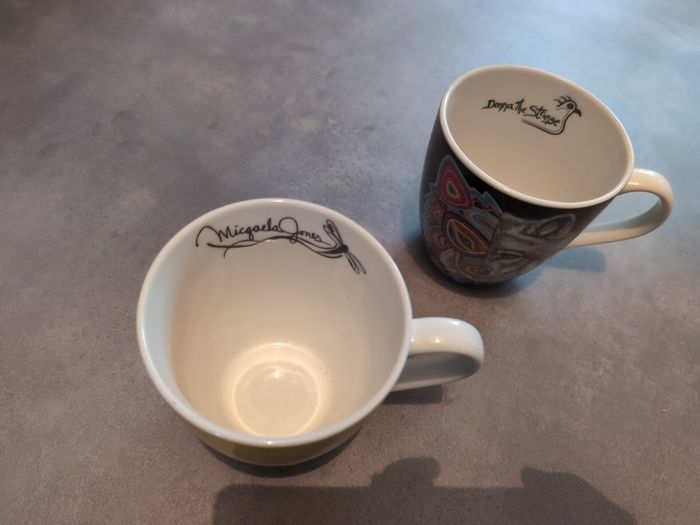 Two designer red Indian cups