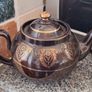 Antique dark brown glazed teapot featuring gold coloured arabesque and floral detailing. Resembles the classic 'Brown Betty' Image 2