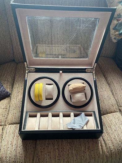 Electric watch moving cabinet