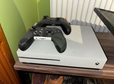 Xbox One S with two controllers and leads