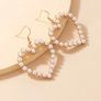 Women's earrings, pearl gold hearts Image 3