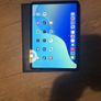 apple i pad 11 generation was used for child has child's name engraved but can be covered with sticker used hand full of times Image 2