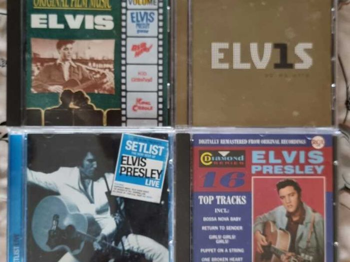 4 CD Set  Elvis Presley, perfect condition.