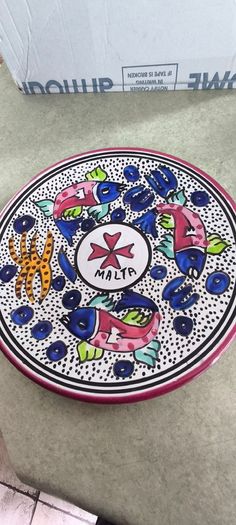 3 hanging wall plates -1- from Malta hand painted -2- from PORTGAL HAND PAINTED-3- FROM MAROCO - EACH IS 22.00 Euro.