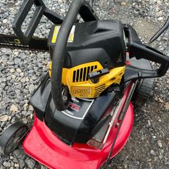 chain saw and lawnmower