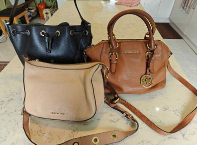 Three Michael Kors Leather bags