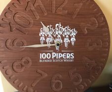 100 Pipers Bar Wall Clock