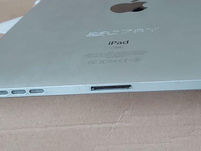 Original Apple Ipad 16GB, No Camera, includes over 20 Family Kids Movies, a real blast from the Past in excellent condition