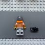 lego city cty1065 Customer minifigure- Female, Medium Nougat Jacket, Light Bluish Gray Legs, Dark Bluish Gray Beanie, Orange Scarf Image 2