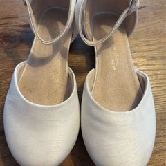 White satin occasion shoe with ankle strap and low heal