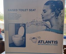 Raised toilet seat