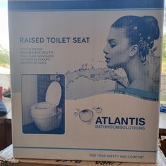 Raised toilet seat