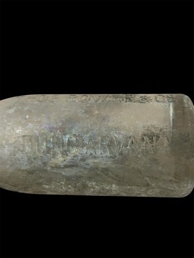 old glass mineral bottle