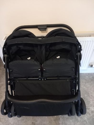 Joie double baby's buggie with rain covers