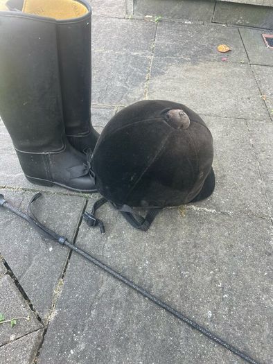 Childs horse riding helmet, boots and whip