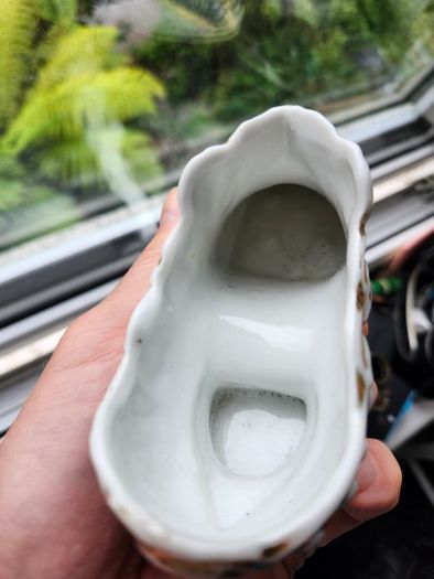 Antique porcelain shoe "For a Good Boy," turn of the 20th century.