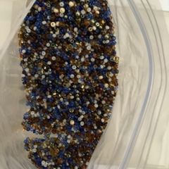 Beads for embroidery or jewellery