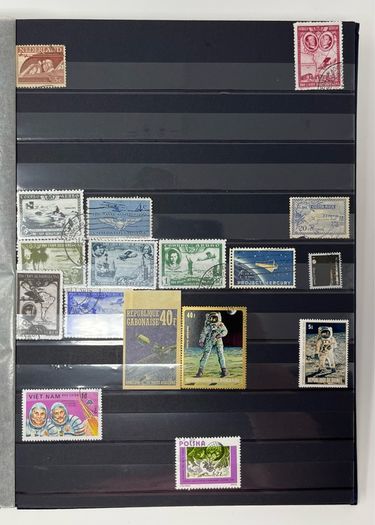 Ace Black 32 page/ 16 leaf Stamp Album with over 900 stamps. Thematic of Animals, Plants, Classic Cars, Space, Trains, Sport & Disney noted.