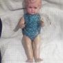 a vintage baby doll.hard plastic Image 3